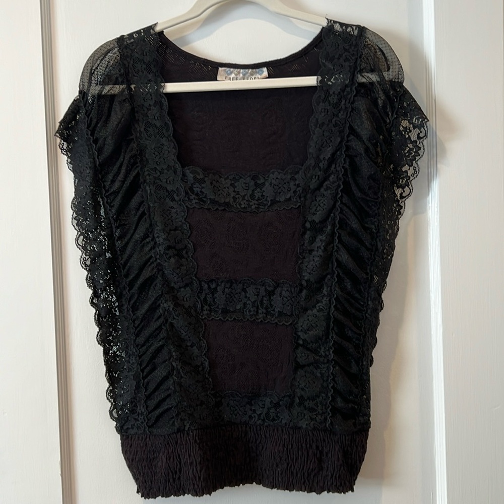 Free people black lace top.